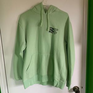 H&M hoodie, lime green with black lettering, size medium